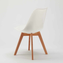 Table blanche ronde 70x70cm 2 chaises colorées d'intérieur bar café Nordica Long Island 