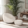 Set poltrona bouclé bianca di design con pouf poggiapiedi girevole Kuma Vendita